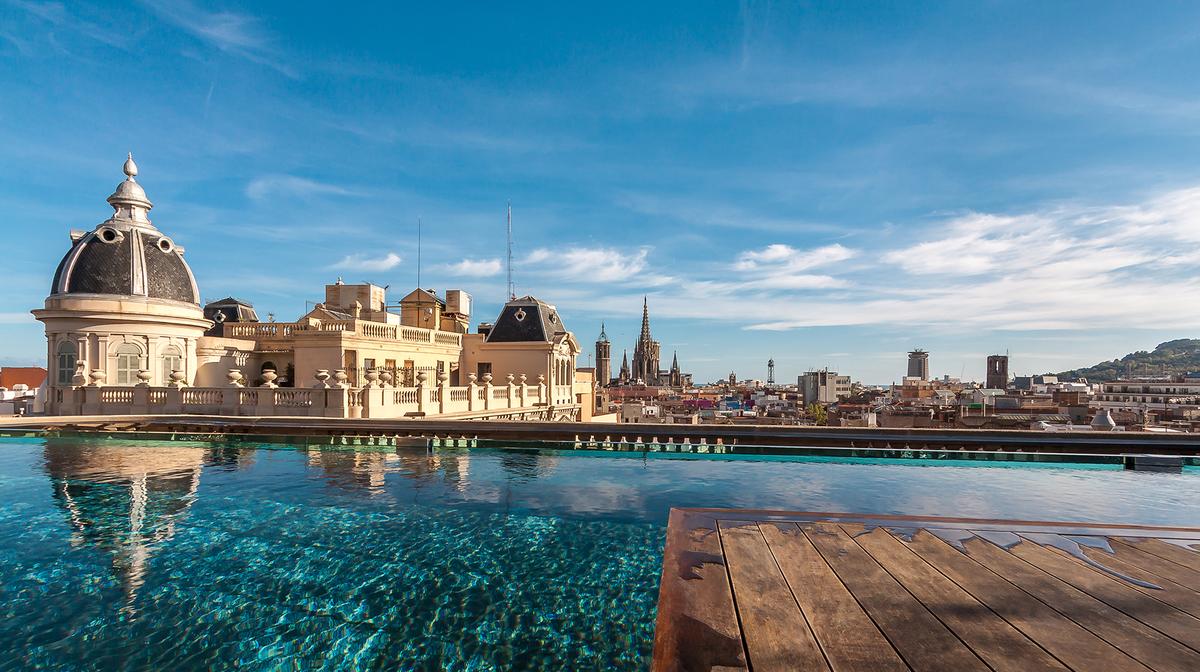 Five-Star Barcelona Escape with Iconic Rooftop Pool, Michelin-Starred Restaurant & Daily Breakfast