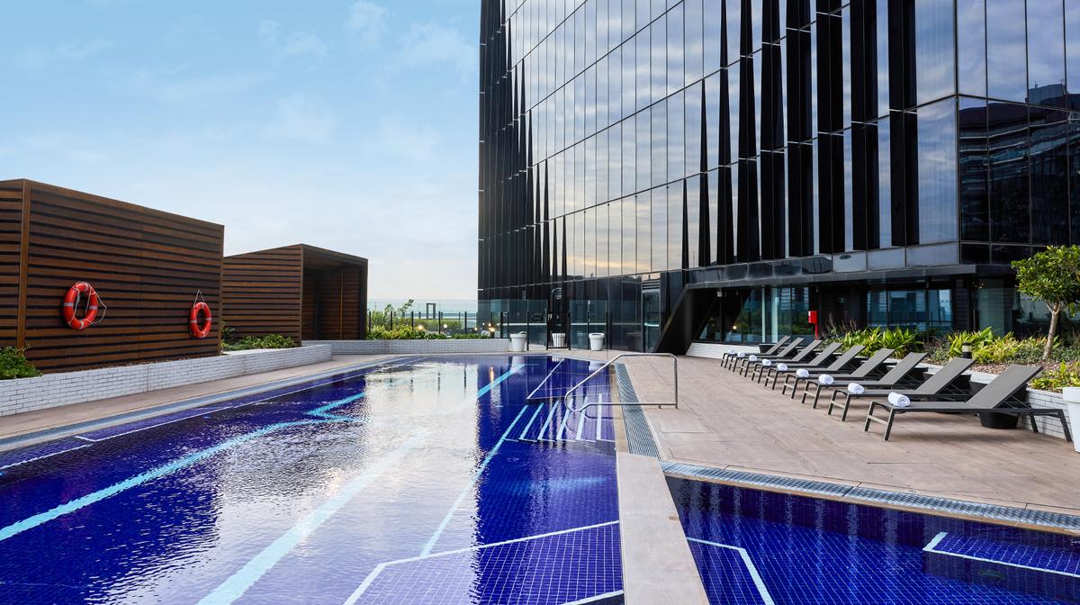 Contemporary Melbourne Docklands Escape with Heated Rooftop Pool, Daily Breakfast & Parking