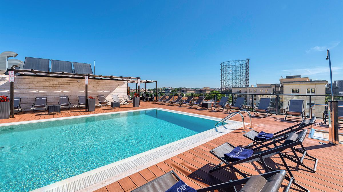 Modern Rome Retreat near the Colosseum with Rooftop Pool & Daily Breakfast