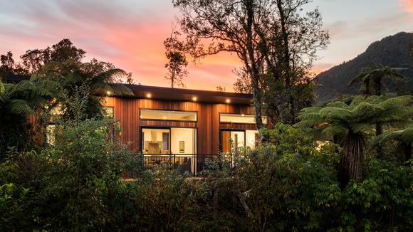 Serene Franz Josef Rainforest Treehouse Escape with Daily Breakfast Hamper & Nightly Drinks