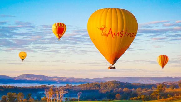 Queensland: Cairns or Gold Coast Hot Air Balloon Experience with Roundtrip Transfers & Glass of Bubbles