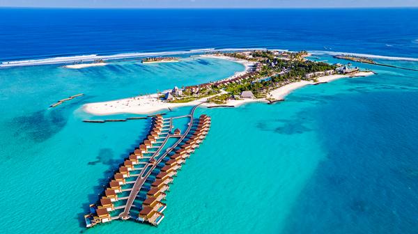 Brand-New, Five-Star Maldives Resort with Prime Surf Break, Daily Breakfast & Dinner, Nightly Cocktails & Roundtrip Speedboat Transfers