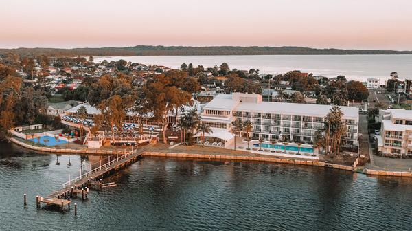 Iconic Hamptons-Inspired Central Coast Waterfront Escape with Daily Breakfast