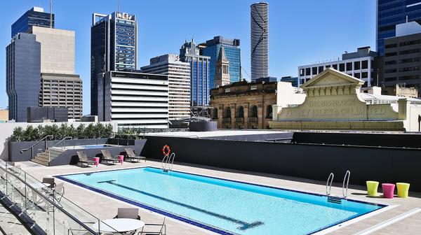 Five-Star Hilton Luxury in the Heart of Brisbane with Daily Breakfast & Nightly Drinks