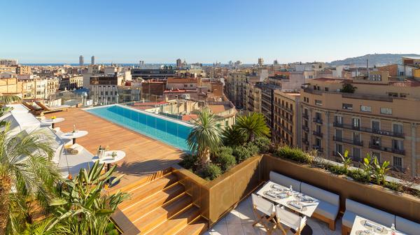 Five-Star Barcelona Luxury with City-View Rooftop Bar & Pool