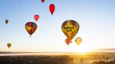 Breathtaking Sunrise Hot Air Balloon Flight with Gourmet Breakfast & Sparkling Wine Tasting