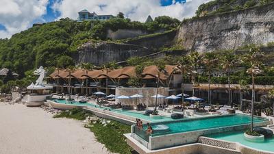 Tropical Temptation Beach Club Experience for Up to Two People with Cocktail, Credit & Optional Lagoon Day Bed Upgrade Available