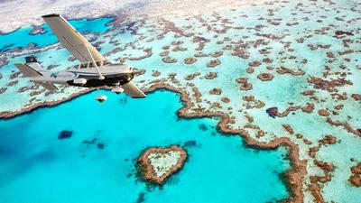 Airlie Beach: 70-Minute Whitsunday Islands & Reef Scenic Flight with Return Hotel Transfers