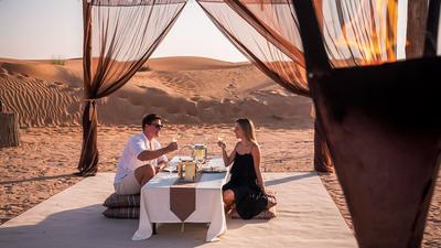 Dubai: Exclusive Dubai Desert Experience in Private Vehicle with Dune Drive, Camel Ride, BQQ Dinner & Drinks 
