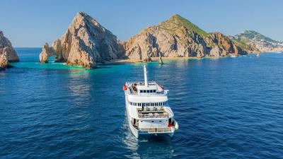 Los Cabos: Luxury Catamaran Dinner Cruise with Free-Flow Cocktails & Live Music