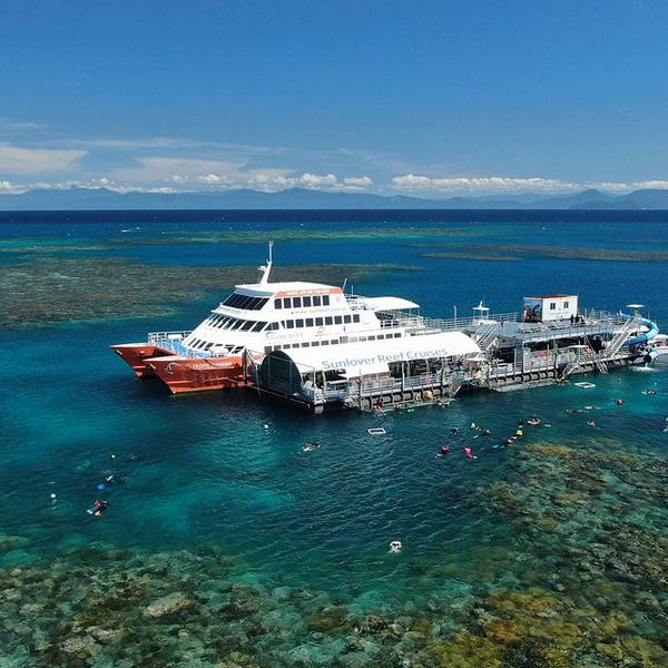 Cairns: Moore Reef Pontoon Full-Day Tour with Underwater Observatory, Waterslide, Snorkelling & Optional Diving Upgrades 1