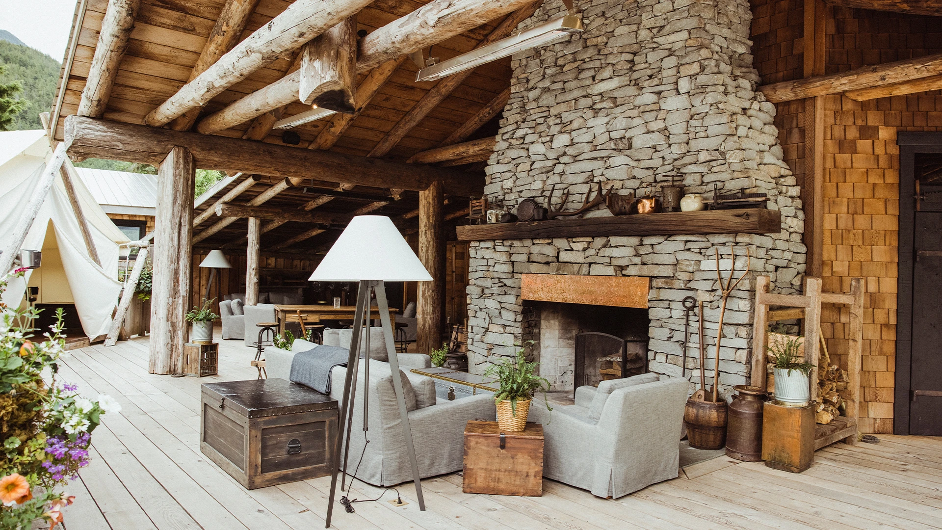 An outdoor fireplace at Clayoquot Wilderness Lodge, Vancouver Island, British Columbia, Canada and one of the Best All Inclusive Resorts of All Time - Luxury Escapes