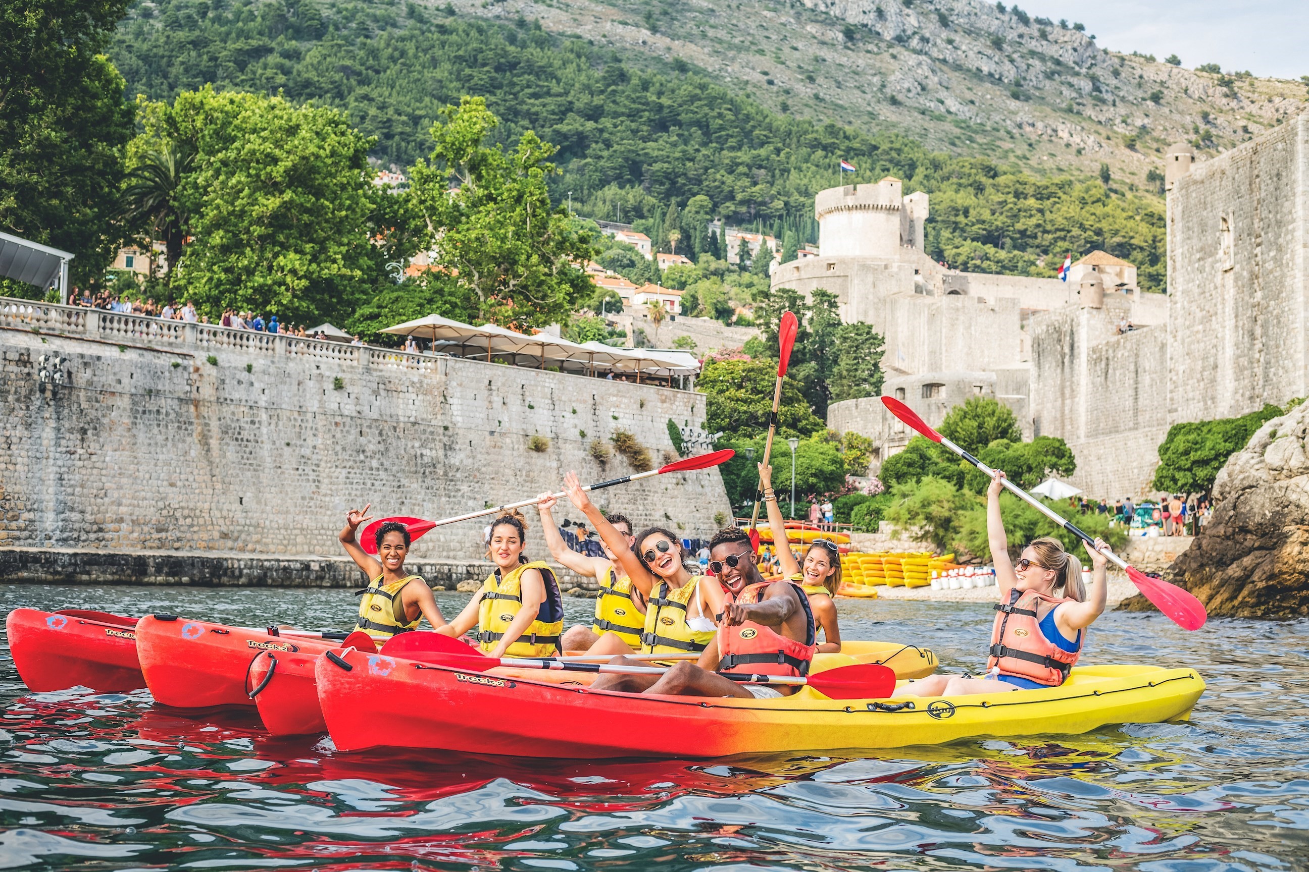 Travellers kayaking in Dubrovnik, Croatia