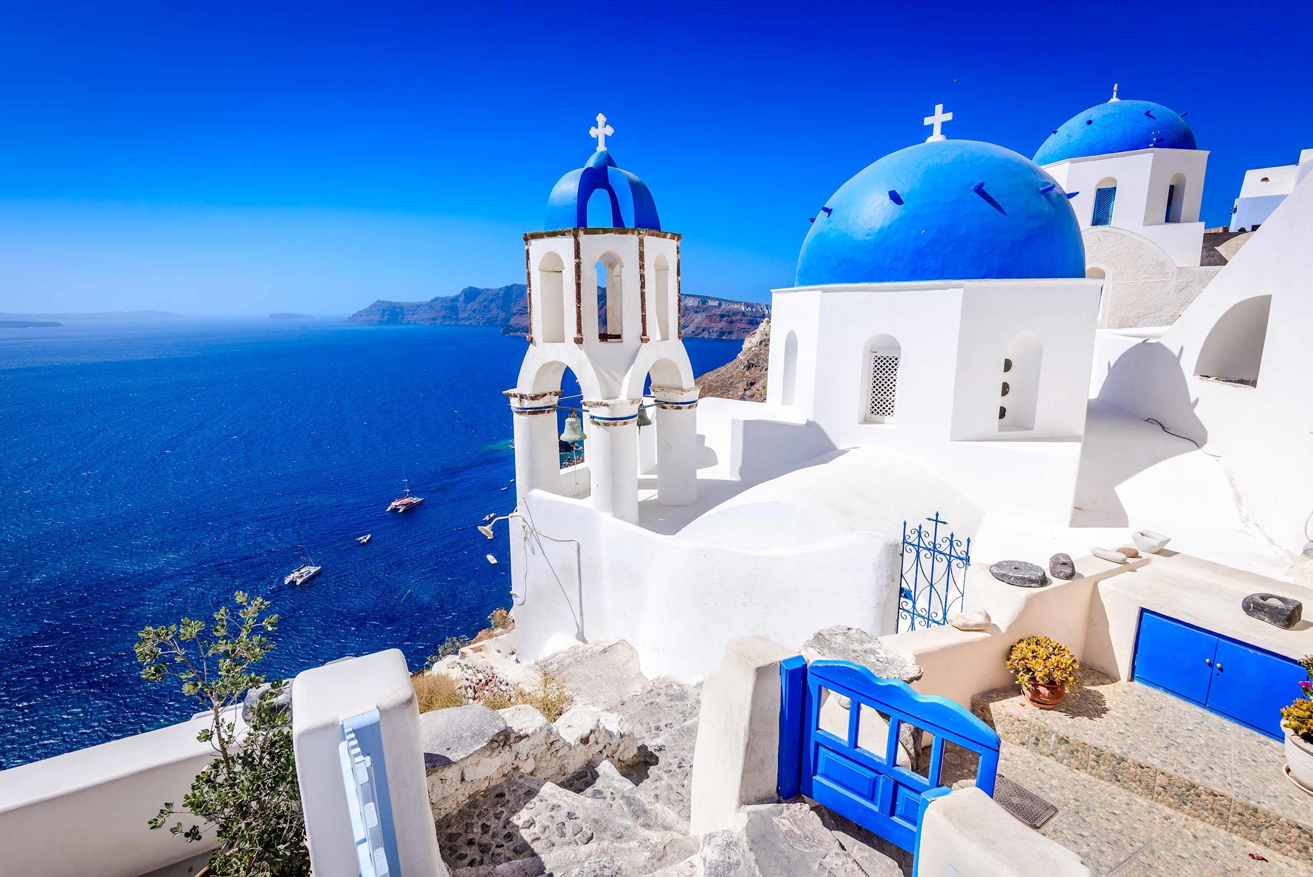 Young Couple Admiring The View In A Greek Island, Greece