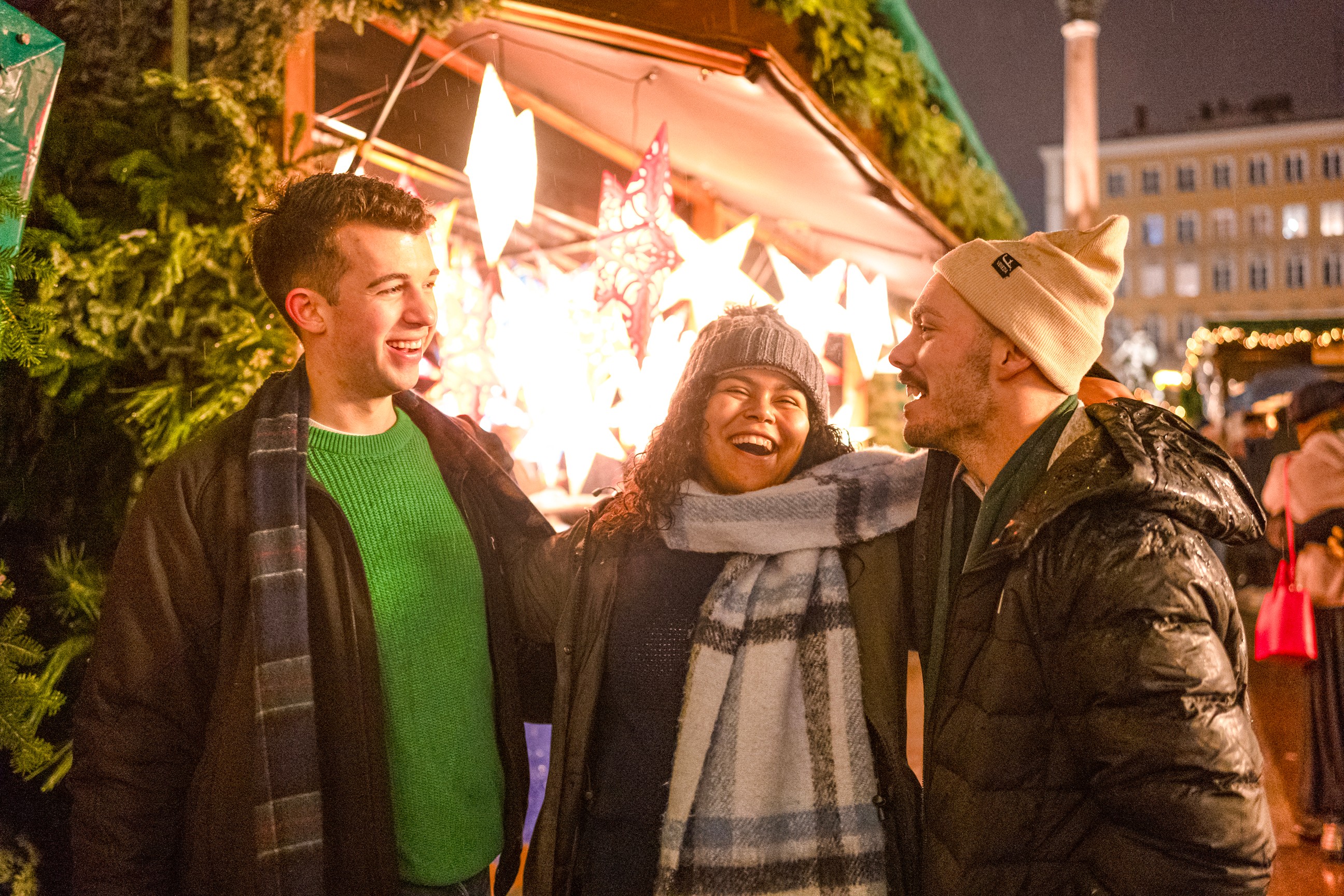 Travellers browsing the German Christmas Market stools, Germany