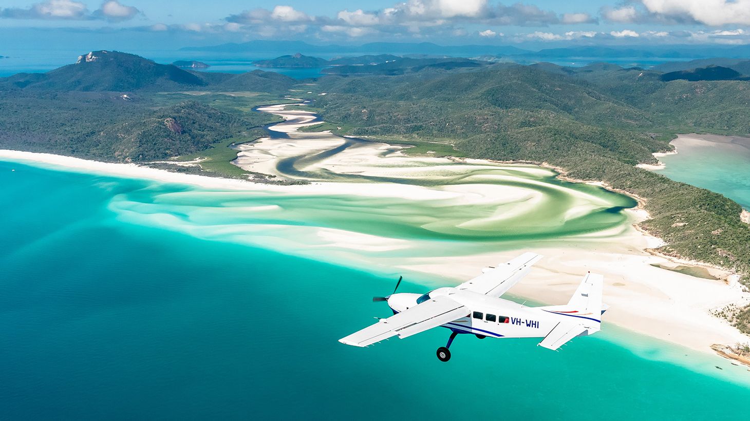 60-Minute Reef Scenic Flight & Full-Day Ocean Rafting Package with Lunch & Transfers 1