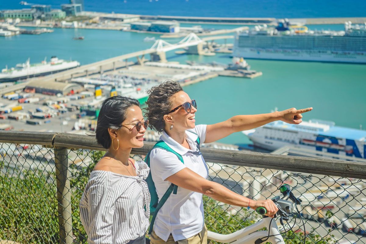 Panoramic Barcelona: E-Bike with Montjuic Cable Car and Boat Trip 