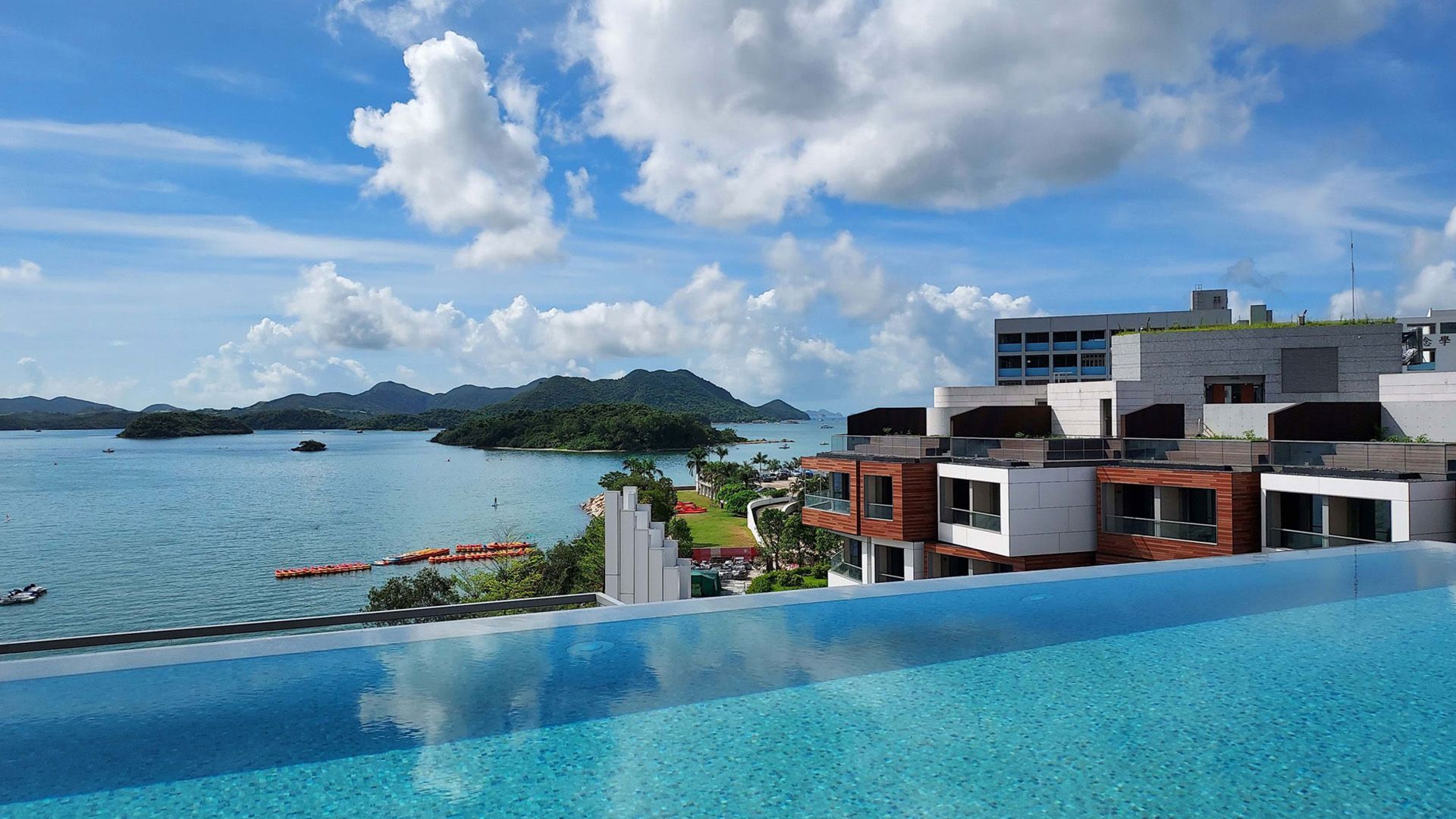 Serene Hong Kong Seaside Escape with Rooftop Infinity Pool, Three Restaurants & International Minimart